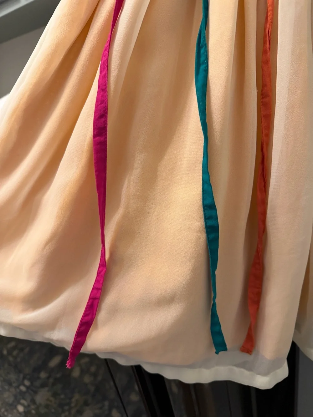 Well Dressed Wolf Cream Chiffon Dress with Pink Straps and Teal & Orange Ribbons